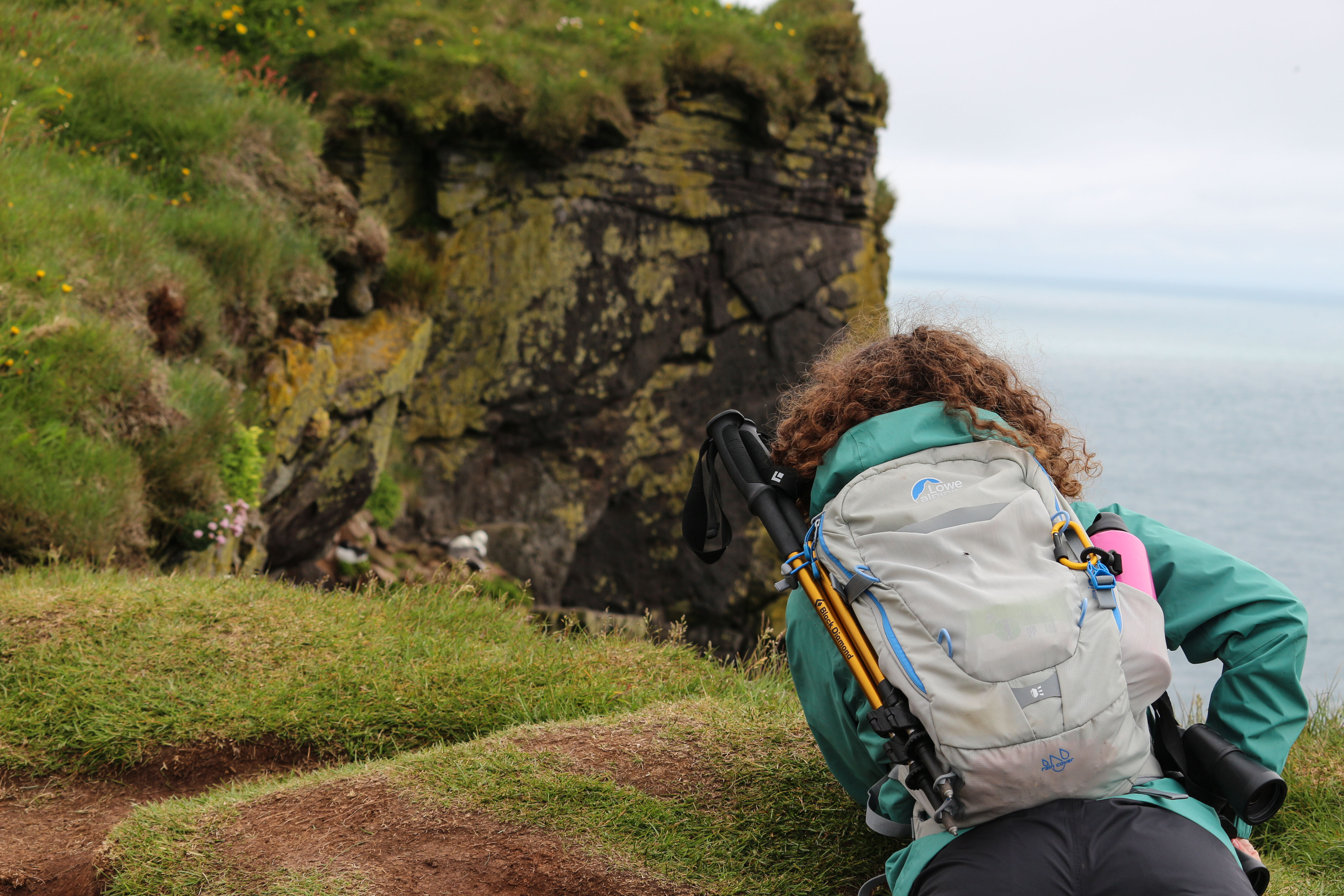 Lying face down on Latrabjarg cliffs