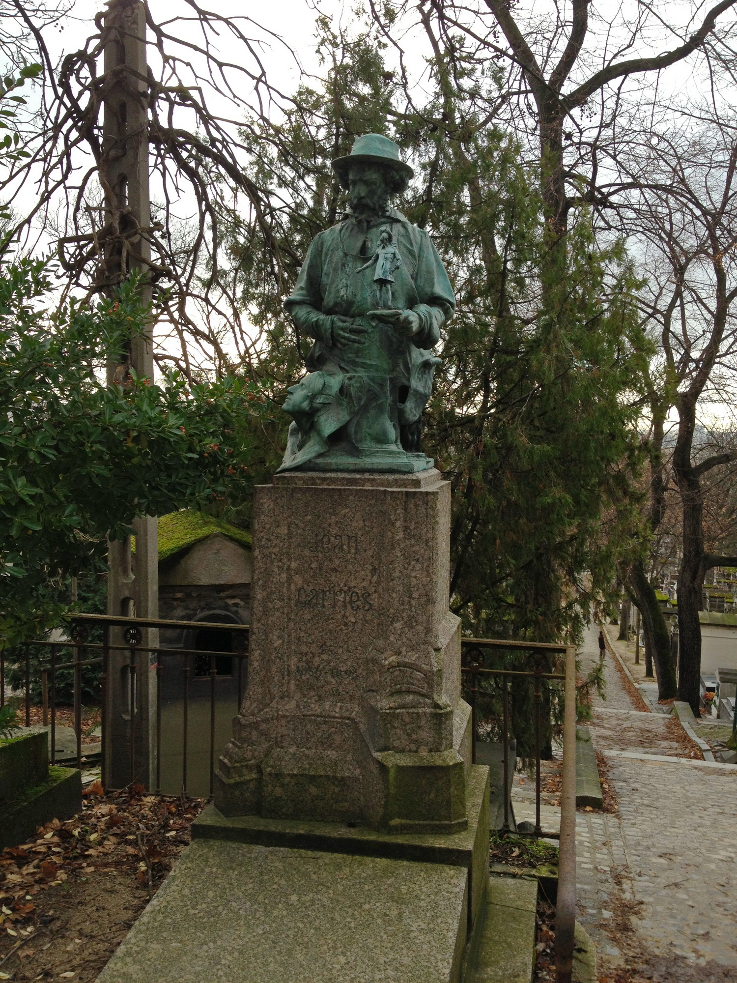 Ventriloquist sculpture at Pere Lachaise Cemetery